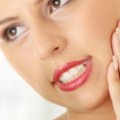 Повышенная чувствительность зубов, ее причины и лечение
